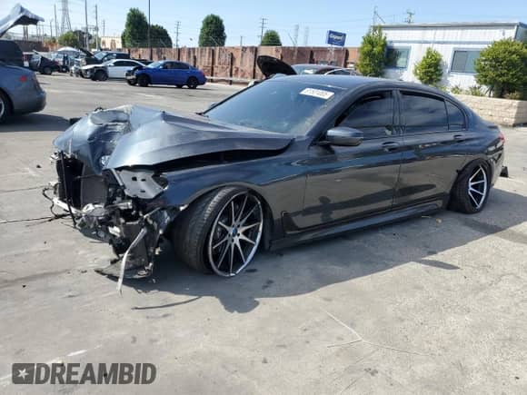 2017 BMW 7 Series 740i с VIN WBA7E2C38HG740803, выставлен на аукционе Copart как лот 81501205 с пробегом Не указан миль и Списание • Salvage title. История ставок и продаж доступна на DreamBid. Изображение 1.