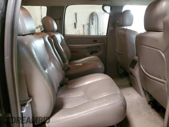 2004 Chevrolet Suburban Z71 z VIN 3GNFK16Z94G101398, wystawiony jako Copart lot #70914914 z przebiegiem 223 578 mil mil oraz Szkoda całkowita • Salvage title. Historia ofert i sprzedaży dostępna na DreamBid. Obrazek 11.