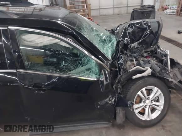 2015 Chevrolet Equinox LT z VIN 2GNALBEK6F1170823, wystawiony jako IAAI lot #42985118 z przebiegiem 105 811 mil mil oraz . Historia ofert i sprzedaży dostępna na DreamBid. Obrazek 6.
