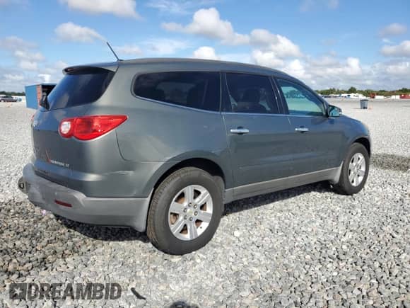 2011 Chevrolet Traverse 1LT с VIN 1GNKVGED0BJ372523, выставлен на аукционе Copart как лот 85563685 с пробегом 121 706 миль миль и Списание • Salvage title. История ставок и продаж доступна на DreamBid. Изображение 3.