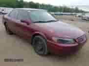 1997 Toyota Camry LE z VIN 4T1BF22K8VU005878, wystawiony jako IAAI lot #42447380 z przebiegiem 180 256 mil mil oraz . Historia ofert i sprzedaży dostępna na DreamBid. Obrazek 1.