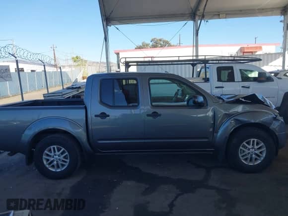 2017 Nissan Frontier SV z VIN 1N6AD0ER0HN727263, wystawiony jako IAAI lot #43399064 z przebiegiem 20 670 mil mil oraz . Historia ofert i sprzedaży dostępna na DreamBid. Obrazek 13.