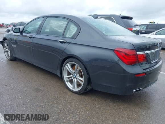 2013 BMW 7 Series 750Li with VIN WBAYE8C5XDD132883, listed as a IAAI auction lot 42470274 with 96,047 mi miles and . Bid and sale history available at DreamBid. Image 3.