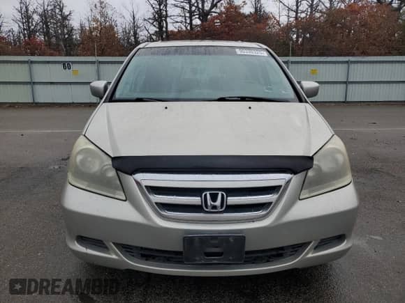 2007 Honda Odyssey EX-L с VIN 5FNRL38787B415077, выставлен на аукционе Copart как лот 90330325 с пробегом 182 719 миль миль и Списание • Salvage title. История ставок и продаж доступна на DreamBid. Изображение 5.
