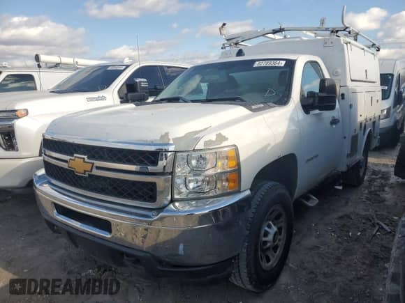 2012 Chevrolet Silverado 2500HD Work Truck z VIN 1GB0CVCG9CF205299, wystawiony jako Copart lot #86161354 z przebiegiem 222 569 mil mil oraz Czysty tytuł • Clean title. Historia ofert i sprzedaży dostępna na DreamBid. Obrazek 1.