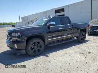 2017 Chevrolet Silverado 1500 LTZ with VIN 1GCVKSEC5HZ149848, listed as a Copart auction lot 54541825 with 104,291 mi miles and Salvage title. Bid and sale history available at DreamBid. Image 1.