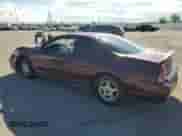2004 Chevrolet Monte Carlo LS with VIN 2G1WW12E849148117, listed as a Copart auction lot 65424555 with 215,126 mi miles and Salvage title. Bid and sale history available at DreamBid. Image 2.