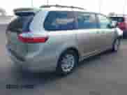 2015 Toyota Sienna XLE with VIN 5TDYK3DC7FS575902, listed as a IAAI auction lot 43337649 with 200,237 mi miles and . Bid and sale history available at DreamBid. Image 4.