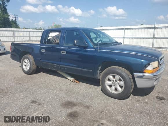 2004 Dodge Dakota SLT with VIN 1D7HL48N34S663905, listed as a Copart auction lot 65787065 with Not provided miles and Salvage title. Bid and sale history available at DreamBid. Image 4.