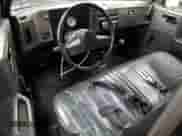 1989 Chevrolet S-10 с VIN 1GCBS14E7K2244623, выставлен на аукционе Copart как лот 69176095 с пробегом 154 024 миль миль и Чистый • Clean title. История ставок и продаж доступна на DreamBid. Изображение 8.