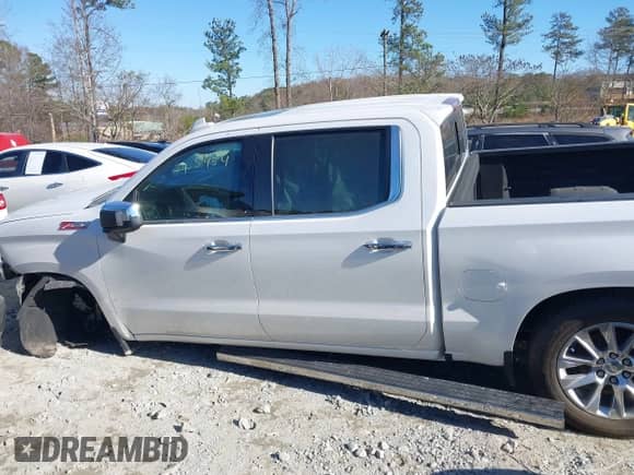 2019 Chevrolet Silverado 1500 LTZ z VIN 1GCUYGEL3KZ123666, wystawiony jako IAAI lot #41145149 z przebiegiem 70 043 mil mil oraz . Historia ofert i sprzedaży dostępna na DreamBid. Obrazek 14.