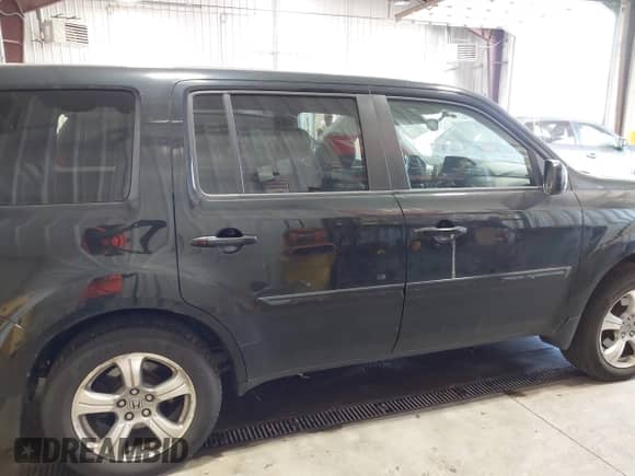 2013 Honda Pilot EX-L with VIN 5FNYF4H57DB056193, listed as a IAAI auction lot 43361917 with 163,618 mi miles and . Bid and sale history available at DreamBid. Image 13.