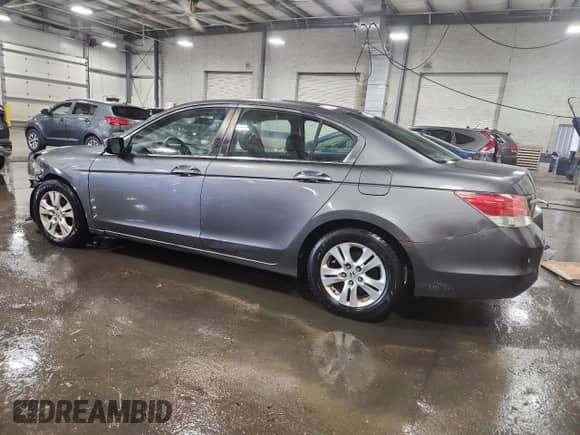 2010 Honda Accord LX-P with VIN 1HGCP2F45AA106889, listed as a Copart auction lot 80745085 with 84,502 mi miles and Salvage title. Bid and sale history available at DreamBid. Image 2.