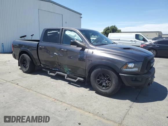 2018 Ram 1500 Rebel z VIN 1C6RR7YT4JS236121, wystawiony jako Copart lot #67679045 z przebiegiem 119 619 mil mil oraz Szkoda całkowita • Salvage title. Historia ofert i sprzedaży dostępna na DreamBid. Obrazek 4.