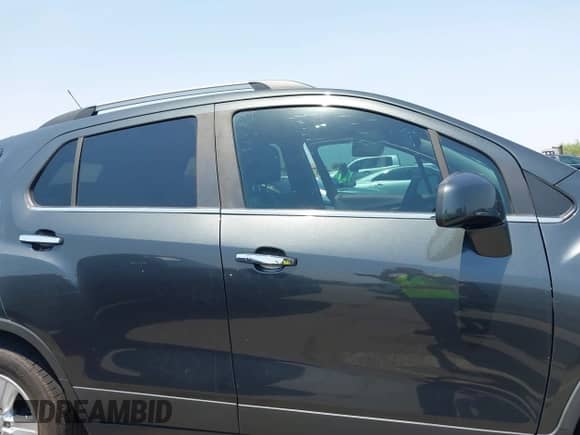 2020 Chevrolet Trax LT z VIN 3GNCJLSB3LL227742, wystawiony jako IAAI lot #42731737 z przebiegiem 65 557 mil mil oraz . Historia ofert i sprzedaży dostępna na DreamBid. Obrazek 13.