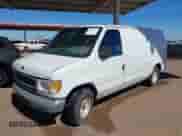 1999 Ford Econoline Cargo with VIN 1FTRE14W8XHA92984, listed as a IAAI auction lot 43317343 with 351,272 mi miles and . Bid and sale history available at DreamBid. Image 2.