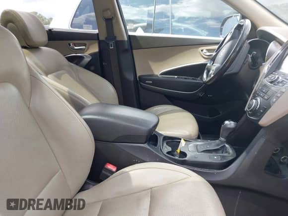 2016 Hyundai Santa Fe SE z VIN KM8SR4HF1GU140233, wystawiony jako IAAI lot #42157646 z przebiegiem 168 373 mil mil oraz . Historia ofert i sprzedaży dostępna na DreamBid. Obrazek 5.