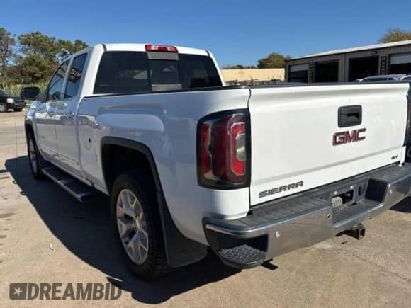 2017 GMC Sierra 1500 SLT z VIN 1GTV2NEJ1HZ175363, wystawiony jako Copart lot #83465374 z przebiegiem 168 048 mil mil oraz Czysty tytuł • Clean title. Historia ofert i sprzedaży dostępna na DreamBid. Obrazek 3.