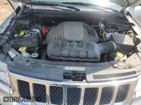 2011 Jeep Grand Cherokee Overland Summit with VIN 1J4RR6GTXBC536210, listed as a Copart auction lot 62634765 with 129,835 mi miles and Salvage title. Bid and sale history available at DreamBid. Image 12.