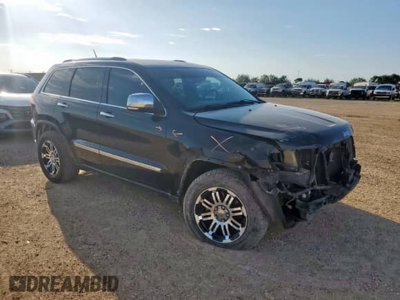 2012 Jeep Grand Cherokee Limited z VIN 1C4RJEBG5CC275197, wystawiony jako Copart lot #63839845 z przebiegiem 158 232 mil mil oraz Szkoda całkowita • Salvage title. Historia ofert i sprzedaży dostępna na DreamBid. Obrazek 4.