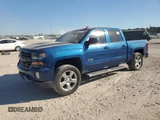 2018 Chevrolet Silverado 1500 LT with VIN 3GCUKREC2JG448899, listed as a Copart auction lot 86643325 with 135,429 mi miles and Clean title. Bid and sale history available at DreamBid. Image 1.