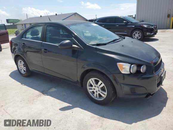 2013 Chevrolet Sonic LT с VIN 1G1JD5SH1D4160761, выставлен на аукционе Copart как лот 61407935 с пробегом 152 962 миль миль и Списание • Salvage title. История ставок и продаж доступна на DreamBid. Изображение 4.