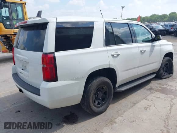 2018 Chevrolet Tahoe Commercial with VIN 1GNLCDEC6JR182144, listed as a IAAI auction lot 42734254 with 182,628 mi miles and . Bid and sale history available at DreamBid. Image 4.