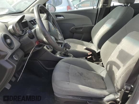 2012 Chevrolet Sonic LS with VIN 1G1JB5SH8C4232611, listed as a Copart auction lot 59201815 with 155,438 mi miles and Clean title. Bid and sale history available at DreamBid. Image 7.