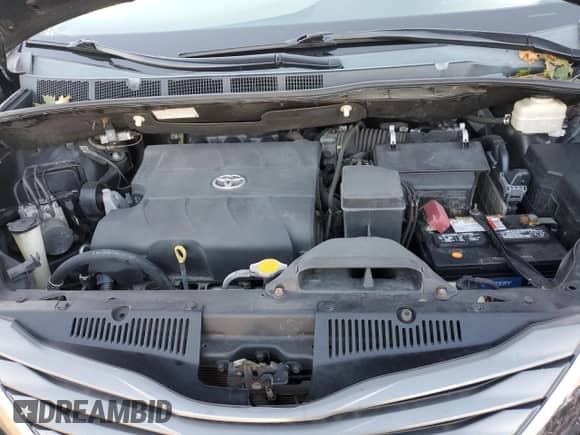 2014 Toyota Sienna XLE with VIN 5TDYK3DC7ES493229, listed as a Copart auction lot 82291585 with 130,411 mi miles and Salvage title. Bid and sale history available at DreamBid. Image 12.