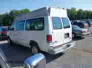 2002 Ford Econoline Cargo with VIN 1FTNE242X2HA90857, listed as a IAAI auction lot 42716391 with 103,796 mi miles and . Bid and sale history available at DreamBid. Image 3.