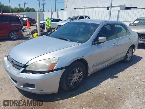 2007 Honda Accord LX SE with VIN 1HGCM56337A159021, listed as a IAAI auction lot 43132308 with 144,422 mi miles and . Bid and sale history available at DreamBid. Image 2.