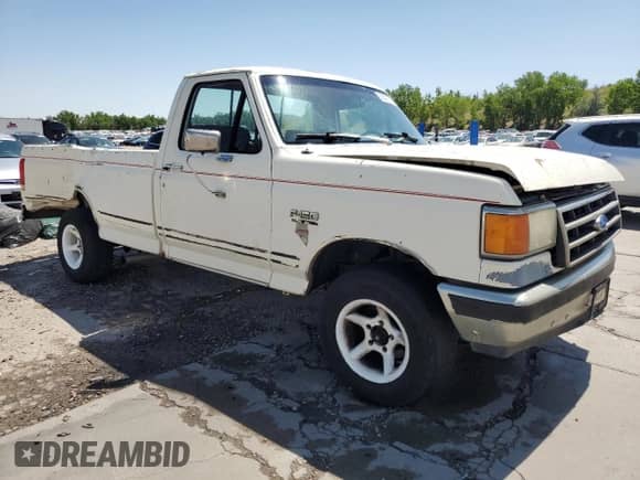 1990 Ford F-150 z VIN 1FTDF15Y5LPA89323, wystawiony jako Copart lot #62608275 z przebiegiem 86 922 mil mil oraz Czysty tytuł • Clean title. Historia ofert i sprzedaży dostępna na DreamBid. Obrazek 4.