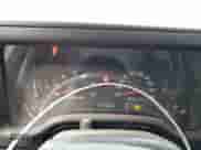 2004 Jeep Wrangler Sport z VIN 1J4FA49S94P714137, wystawiony jako Copart lot #80966325 z przebiegiem 142 534 mil mil oraz Czysty tytuł • Clean title. Historia ofert i sprzedaży dostępna na DreamBid. Obrazek 9.