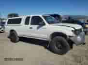 1998 Toyota Tacoma с VIN 4TAWN72N0WZ039233, выставлен на аукционе Copart как лот 90082605 с пробегом 246 392 миль миль и Списание • Salvage title. История ставок и продаж доступна на DreamBid. Изображение 4.