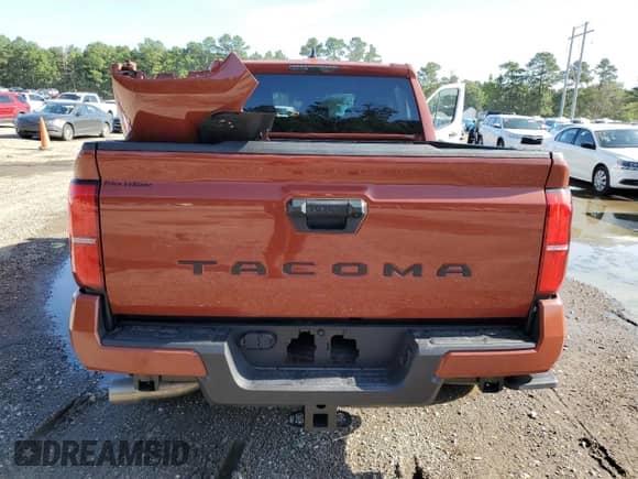 2025 Toyota Tacoma SR5 with VIN 3TMKB5FN5SM030579, listed as a Copart auction lot 63677545 with 1,569 mi miles and Salvage title. Bid and sale history available at DreamBid. Image 6.