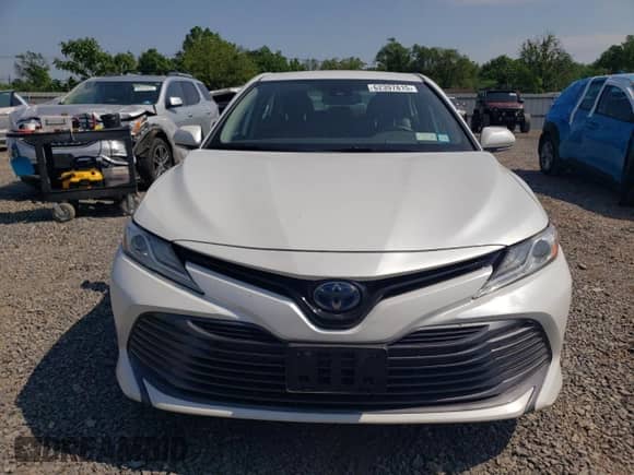 2019 Toyota Camry Hybrid LE с VIN 4T1B21HK5KU014272, выставлен на аукционе Copart как лот 62397815 с пробегом 59 834 миль миль и Списание • Salvage title. История ставок и продаж доступна на DreamBid. Изображение 5.
