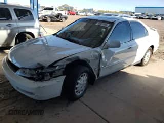 1996 Honda Accord EX with VIN 1HGCD5554TA106096, listed as a Copart auction lot 49801955 with 318,755 mi miles and Salvage title. Bid and sale history available at DreamBid. Image 1.