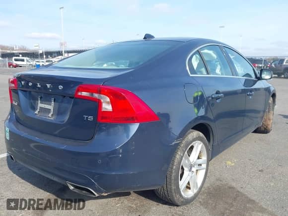 2015 Volvo S60 T5 Drive-E Premier with VIN YV126MFK1F2336609, listed as a IAAI auction lot 41786376 with 50,538 mi miles and . Bid and sale history available at DreamBid. Image 4.