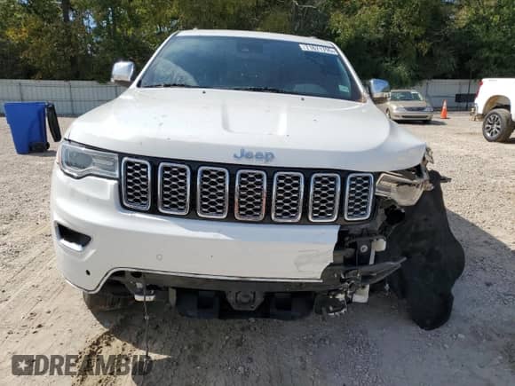 2017 Jeep Grand Cherokee Overland with VIN 1C4RJFCGXHC964499, listed as a Copart auction lot 71671795 with 117,302 mi miles and Salvage title. Bid and sale history available at DreamBid. Image 5.