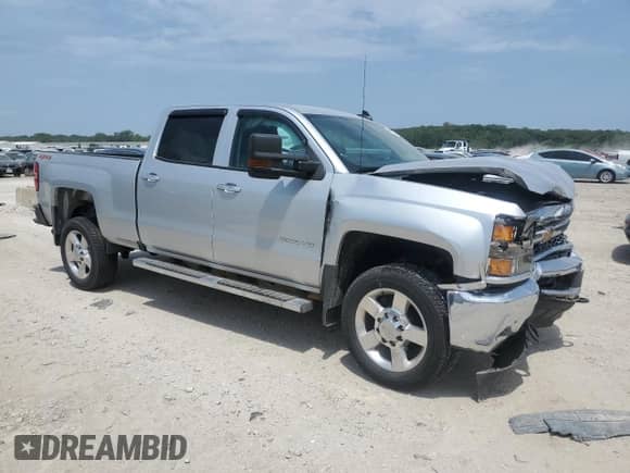 2019 Chevrolet Silverado 2500HD Work Truck z VIN 1GC1KREG9KF155249, wystawiony jako Copart lot #64574945 z przebiegiem 125 038 mil mil oraz Szkoda całkowita • Salvage title. Historia ofert i sprzedaży dostępna na DreamBid. Obrazek 4.