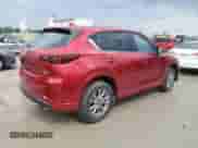 2025 Mazda CX-5 S Carbon Edition z VIN JM3KFBCM0S0694877, wystawiony jako Copart lot #81332425 z przebiegiem 299 mil mil oraz Szkoda całkowita • Salvage title. Historia ofert i sprzedaży dostępna na DreamBid. Obrazek 3.