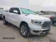 2020 Ram 1500 Longhorn with VIN 1C6SRFKT5LN304433, listed as a IAAI auction lot 41172491 with 121,344 mi miles and . Bid and sale history available at DreamBid. Image 1.