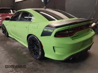 2023 Dodge Charger Scat Pack with VIN 2C3CDXGJXPH533833, listed as a IAAI auction lot 42148348 with 6,013 mi miles and . Bid and sale history available at DreamBid. Image 3.