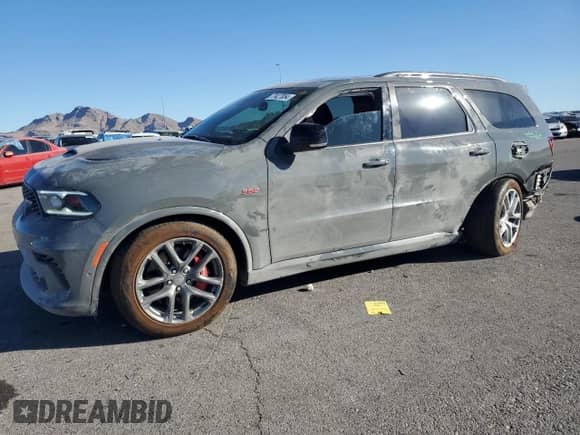 2024 Dodge Durango SRT 392 Premium с VIN 1C4SDJGJ4RC107999, выставлен на аукционе Copart как лот 77427854 с пробегом 979 миль миль и Списание • Salvage title. История ставок и продаж доступна на DreamBid. Изображение 1.
