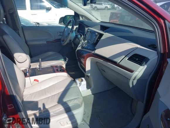 2012 Toyota Sienna XLE with VIN 5TDDK3DC7CS033189, listed as a IAAI auction lot 42814115 with 260,566 mi miles and . Bid and sale history available at DreamBid. Image 5.