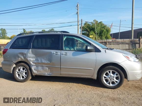 2005 Toyota Sienna LE with VIN 5TDBA23C15S044763, listed as a IAAI auction lot 43232791 with 142,034 mi miles and . Bid and sale history available at DreamBid. Image 13.