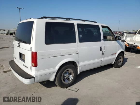 2002 Chevrolet Astro с VIN 1GNEL19X12B127227, выставлен на аукционе Copart как лот 77872814 с пробегом Не указан миль и Списание • Salvage title. История ставок и продаж доступна на DreamBid. Изображение 3.