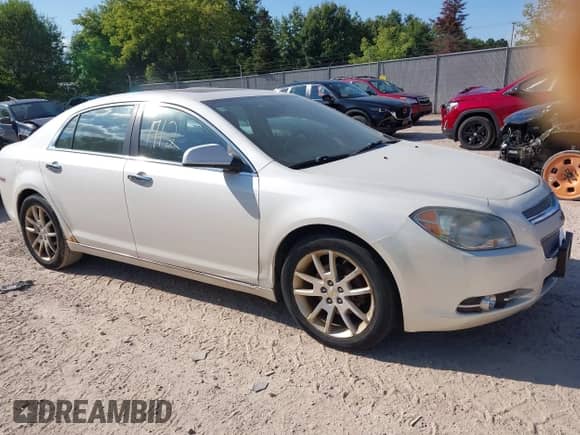 2010 Chevrolet Malibu LTZ with VIN 1G1ZE5EB3AF141099, listed as a IAAI auction lot 43111712 with 163,109 mi miles and . Bid and sale history available at DreamBid. Image 1.