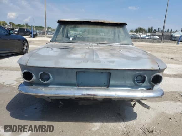 1964 Chevrolet Corvair with VIN 40969W180730, listed as a Copart auction lot 50413065 with 62,429 mi miles and Clean title. Bid and sale history available at DreamBid. Image 6.