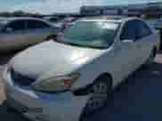 2002 Toyota Camry LE z VIN 4T1BE32K12U060208, wystawiony jako IAAI lot #43310242 z przebiegiem 255 576 mil mil oraz . Historia ofert i sprzedaży dostępna na DreamBid. Obrazek 6.